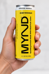 Hand holding a yellow can of MYND Orange Mango sparkling protein water with 20g whey protein isolate.